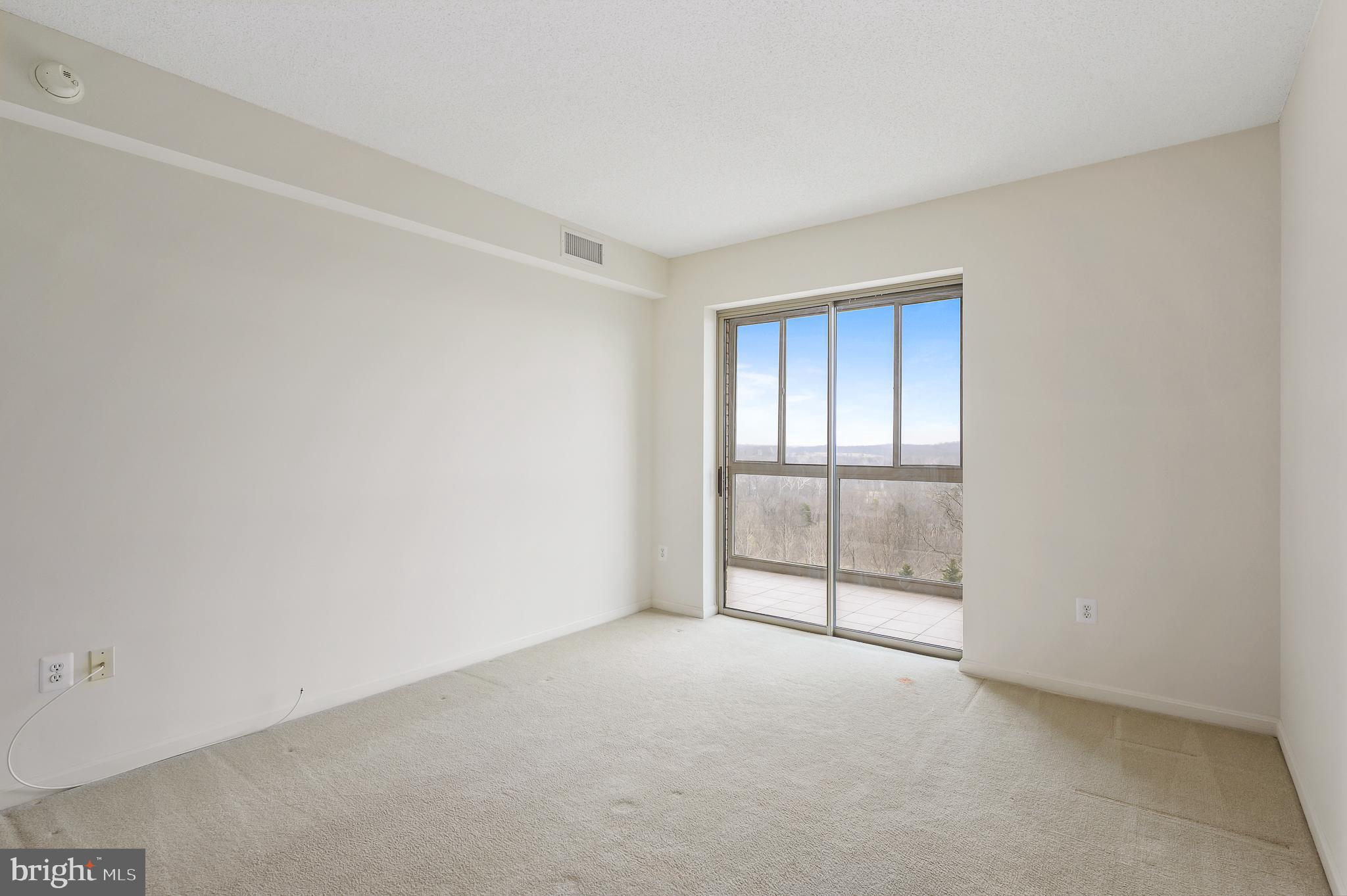 19355 Cypress Ridge Terrace, Unit 515 Leesburg, VA 20176 - Photo 18 of 33 Owner's Bedroom with access to sunroom