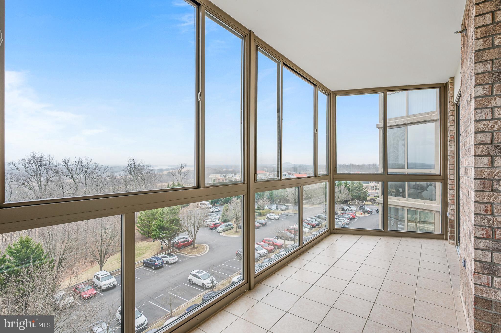 19355 Cypress Ridge Terrace, Unit 515 Leesburg, VA 20176 - Photo 6 of 33 Sunroom with gorgeous view!