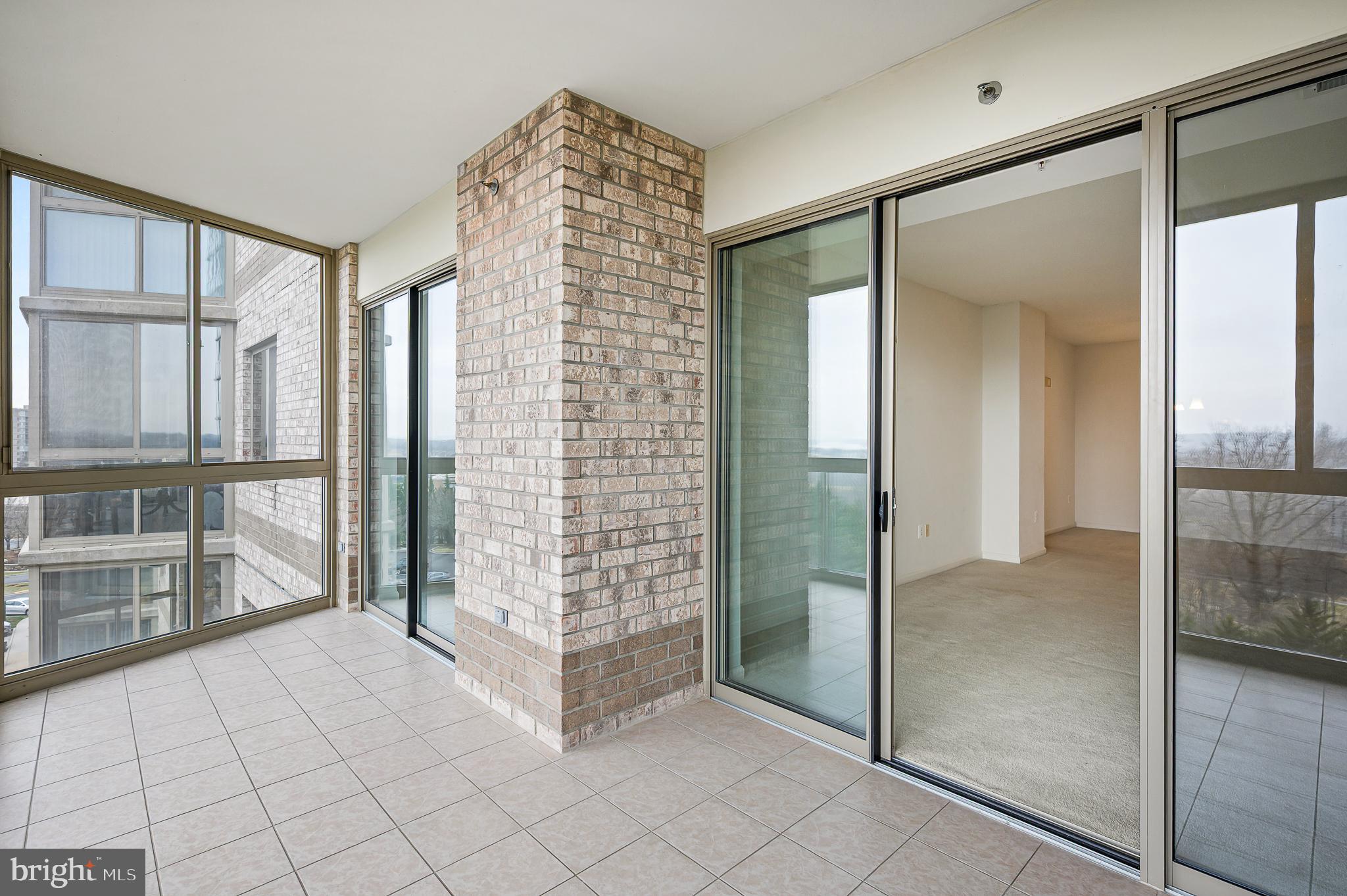 19355 Cypress Ridge Terrace, Unit 515 Leesburg, VA 20176 - Photo 8 of 33 Sunroom