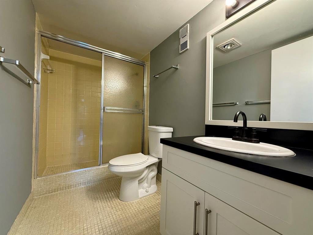 9450 Live Oak Place, Unit 303 Davie, FL 33324 - Photo 11 of 24 a bathroom with a sink and a mirror