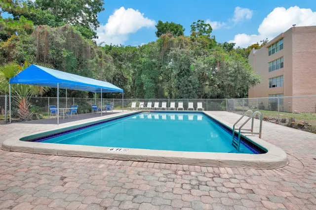 a view of outdoor space swimming pool and patio