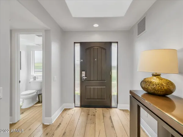 a bedroom with a bed and a view of bathroom