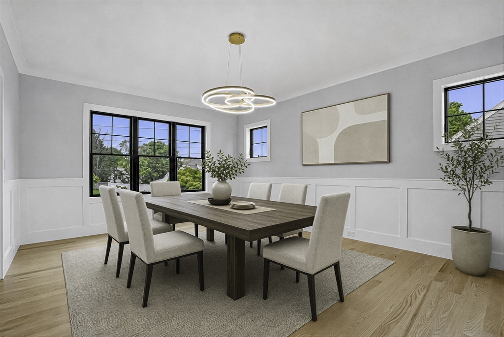 18 Avon Circle Needham, MA 02494 - Photo 9 of 18 a view of a dining room with furniture window and wooden floor