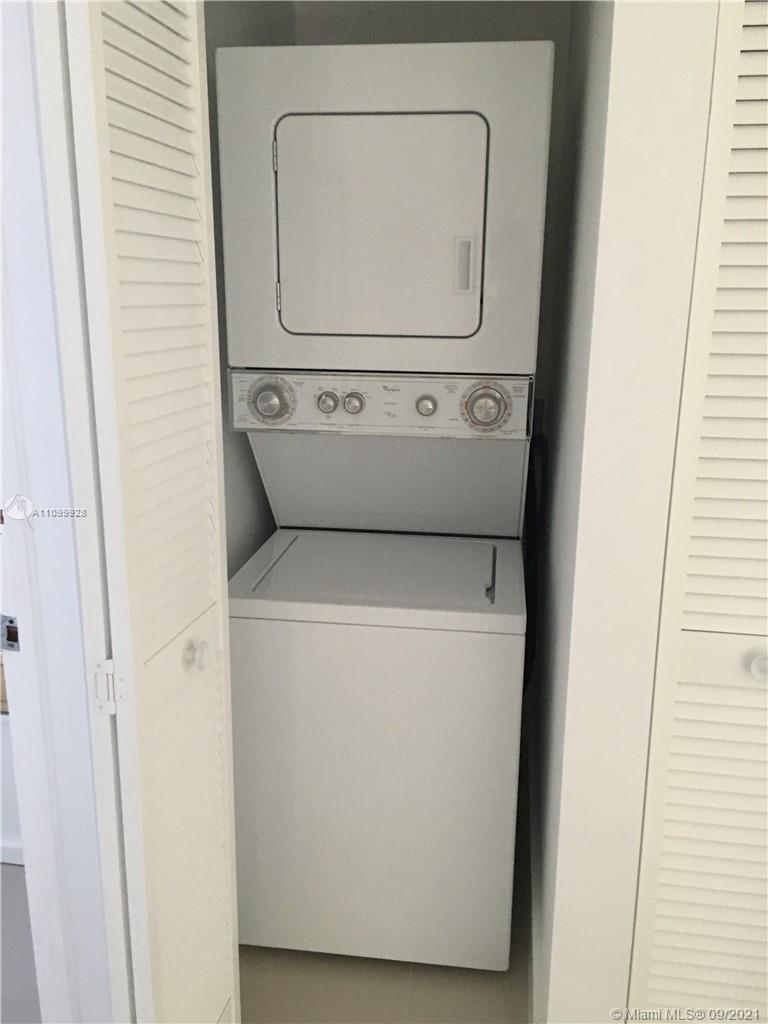 60 Park Drive, Unit D Bal Harbour, FL 33154 - Photo 7 of 13 a utility room with dryer and washer