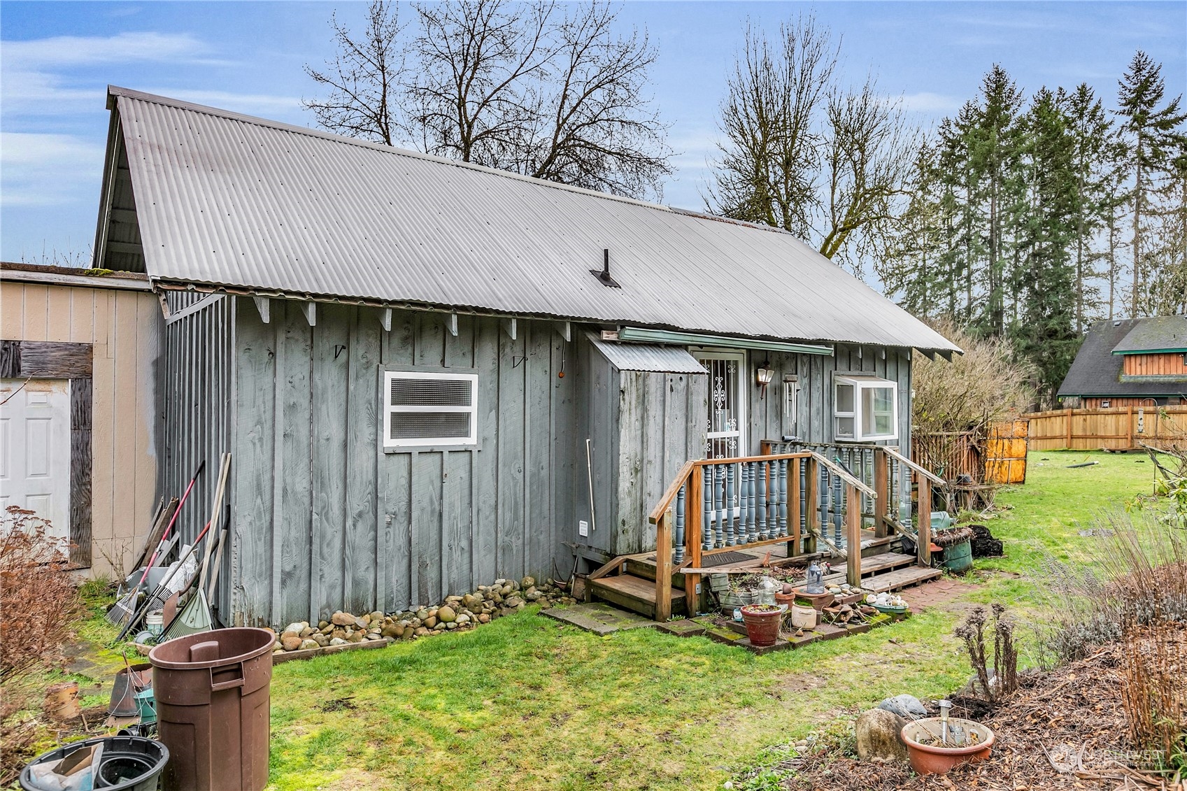 25115 72nd Avenue East Graham, WA 98338 - Photo 1 of 24 a view of a house with backyard