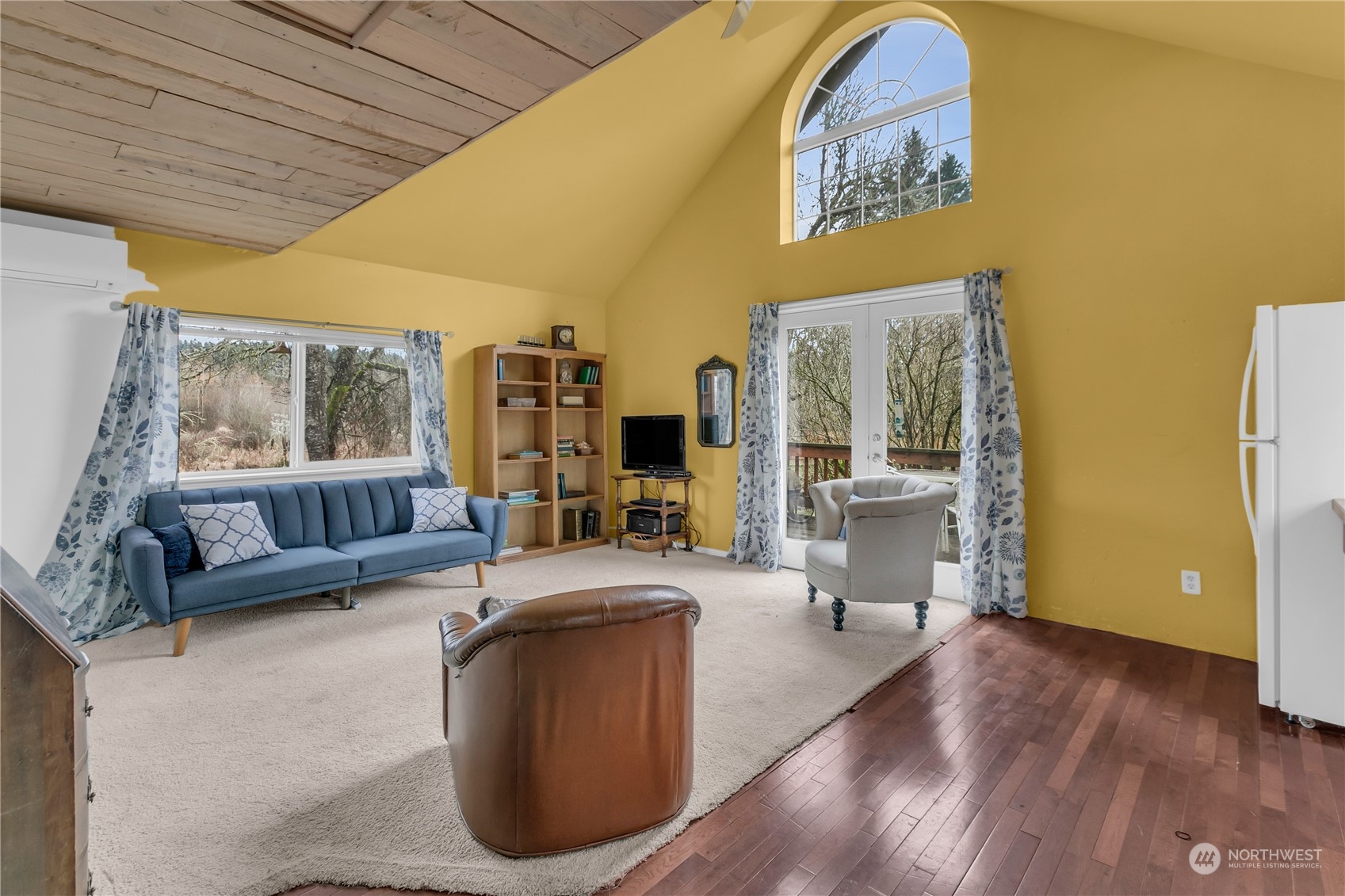 25115 72nd Avenue East Graham, WA 98338 - Photo 11 of 24 a living room with furniture and a large window