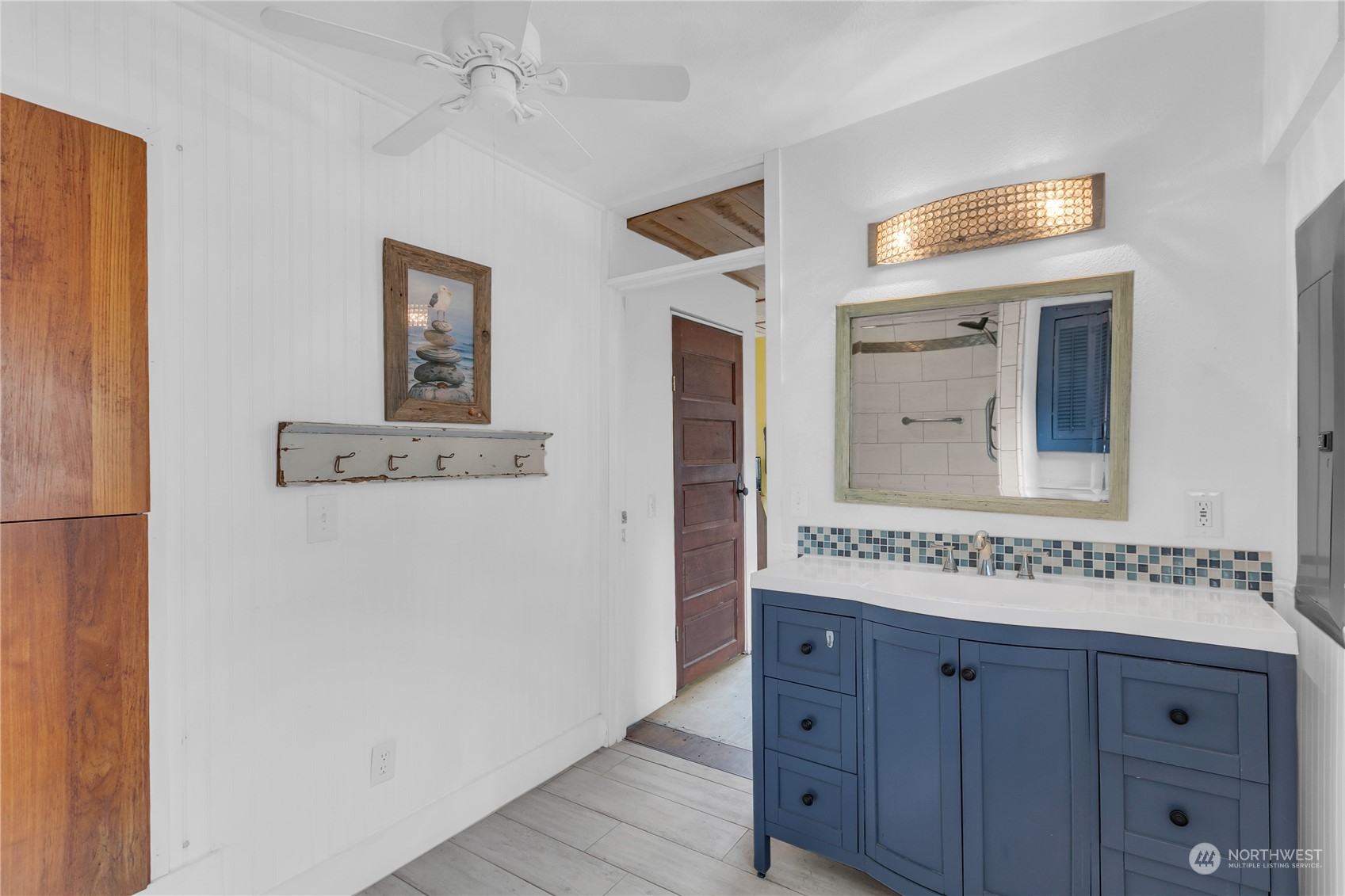 25115 72nd Avenue East Graham, WA 98338 - Photo 13 of 24 a bathroom with a granite countertop sink and a mirror