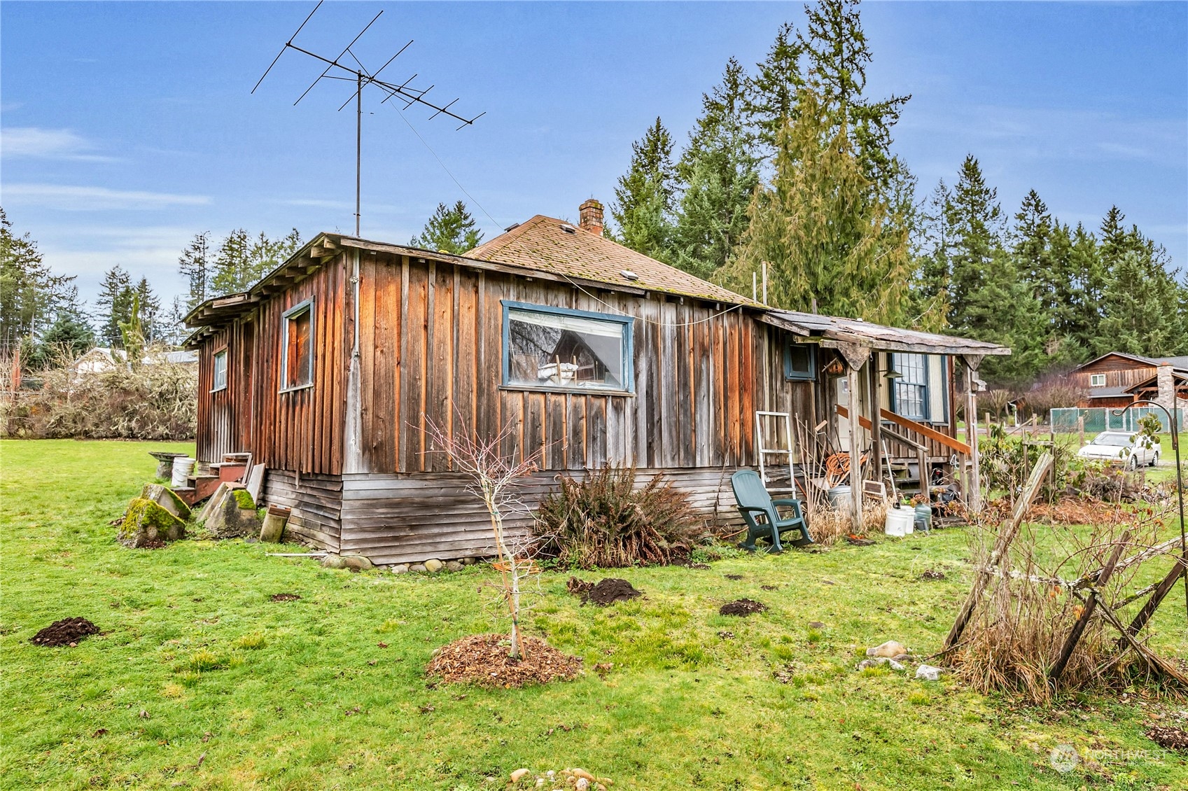 25115 72nd Avenue East Graham, WA 98338 - Photo 18 of 24 a front view of a house with garden