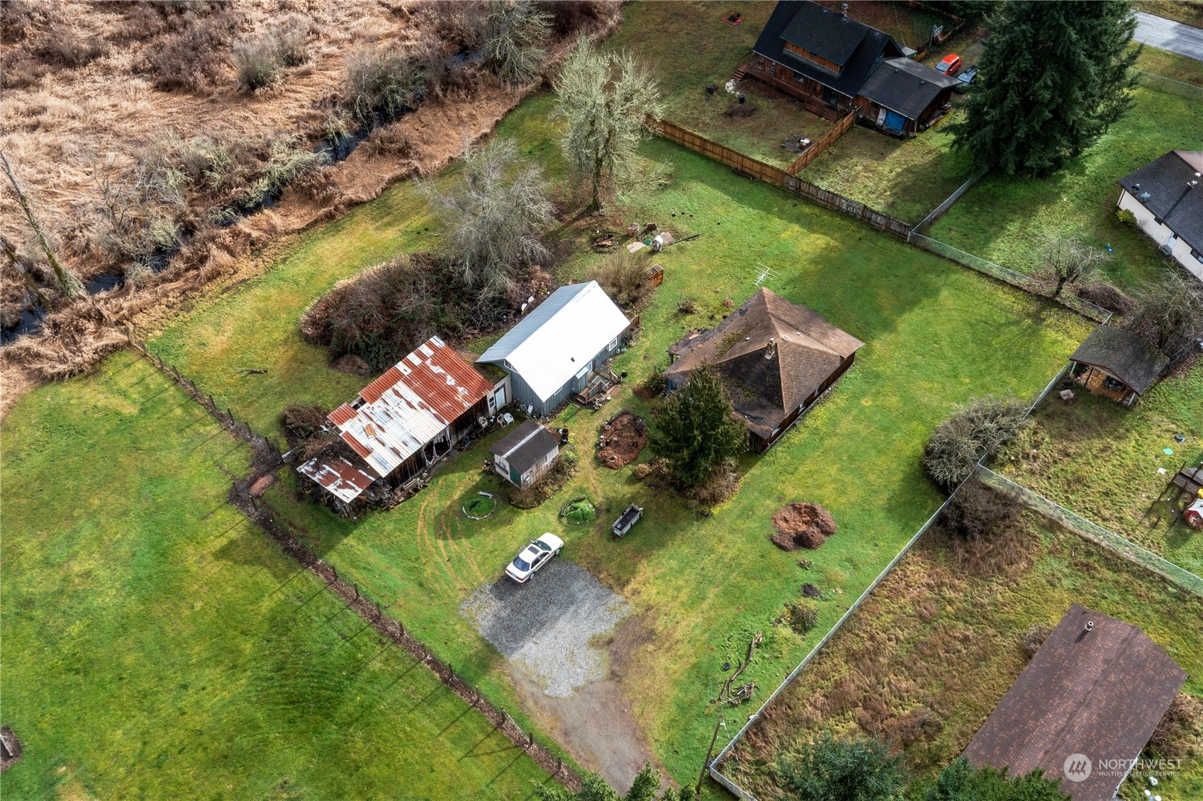 25115 72nd Avenue East Graham, WA 98338 - Photo 2 of 24 an aerial view of a house with a yard