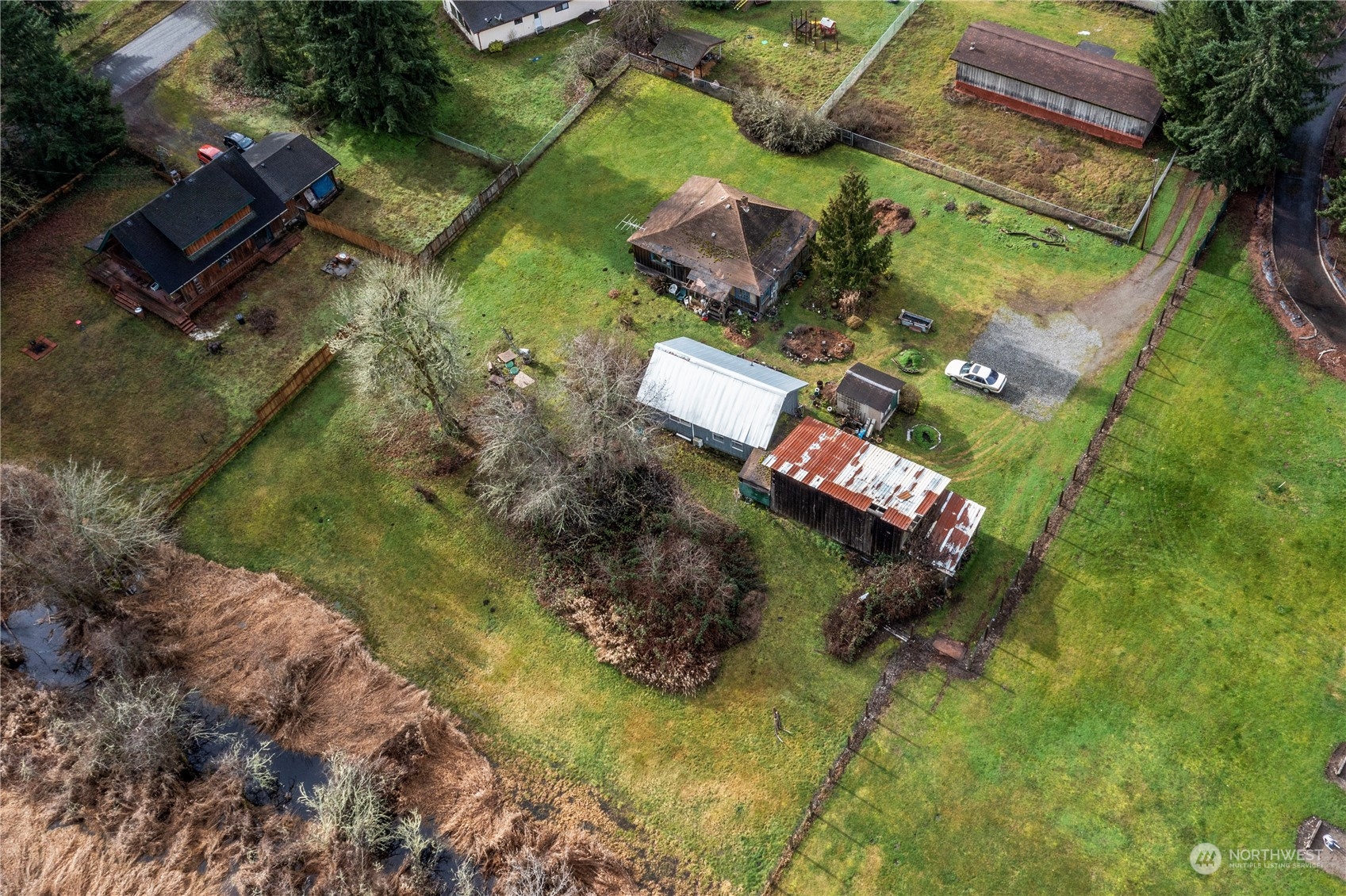 25115 72nd Avenue East Graham, WA 98338 - Photo 23 of 24 an aerial view of a house with a yard