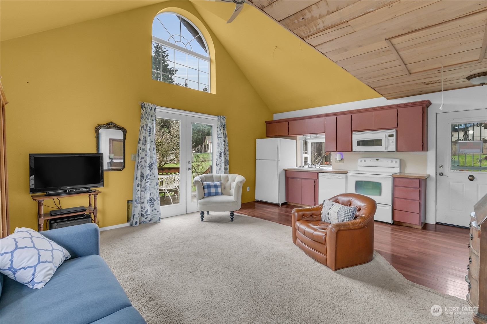 25115 72nd Avenue East Graham, WA 98338 - Photo 6 of 24 a living room with furniture and a flat screen tv