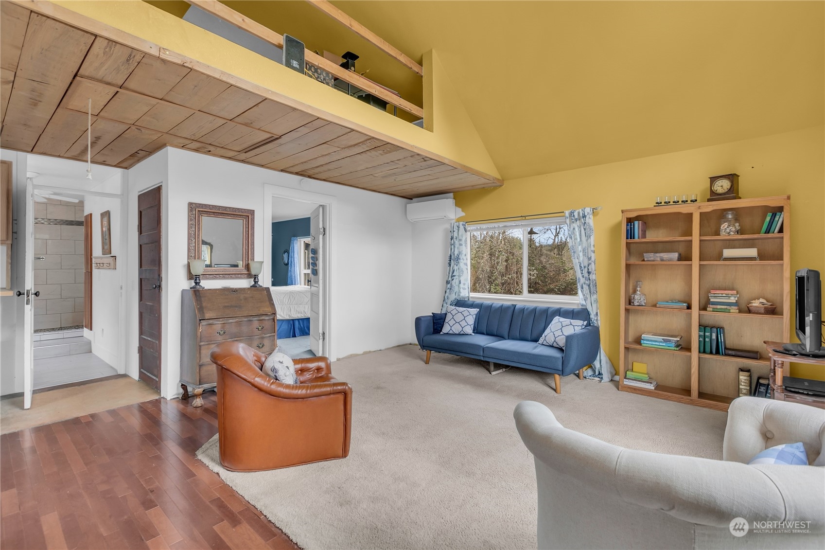 25115 72nd Avenue East Graham, WA 98338 - Photo 7 of 24 a living room with furniture a window and a table