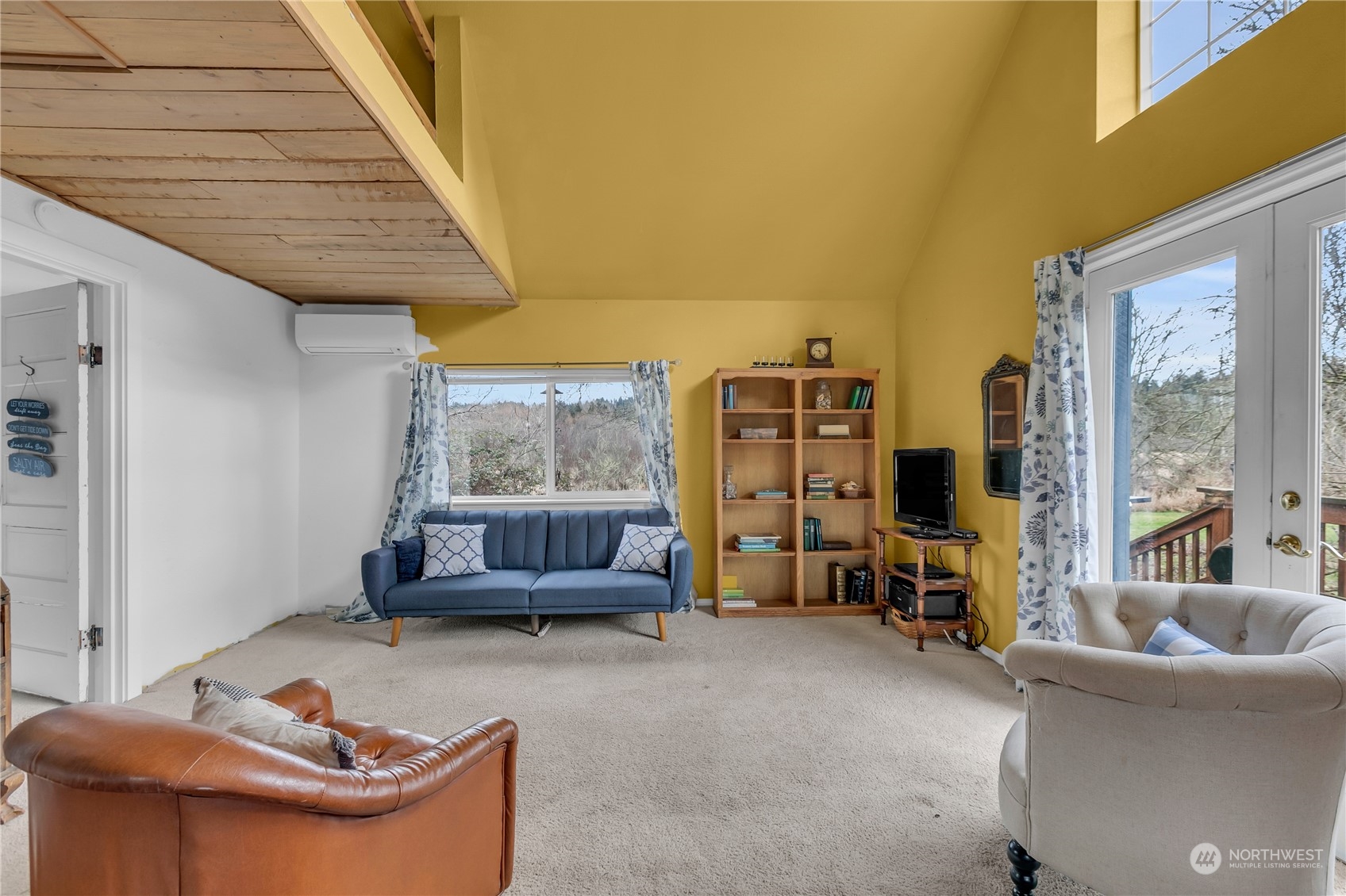 25115 72nd Avenue East Graham, WA 98338 - Photo 10 of 24 a living room with furniture and a large window