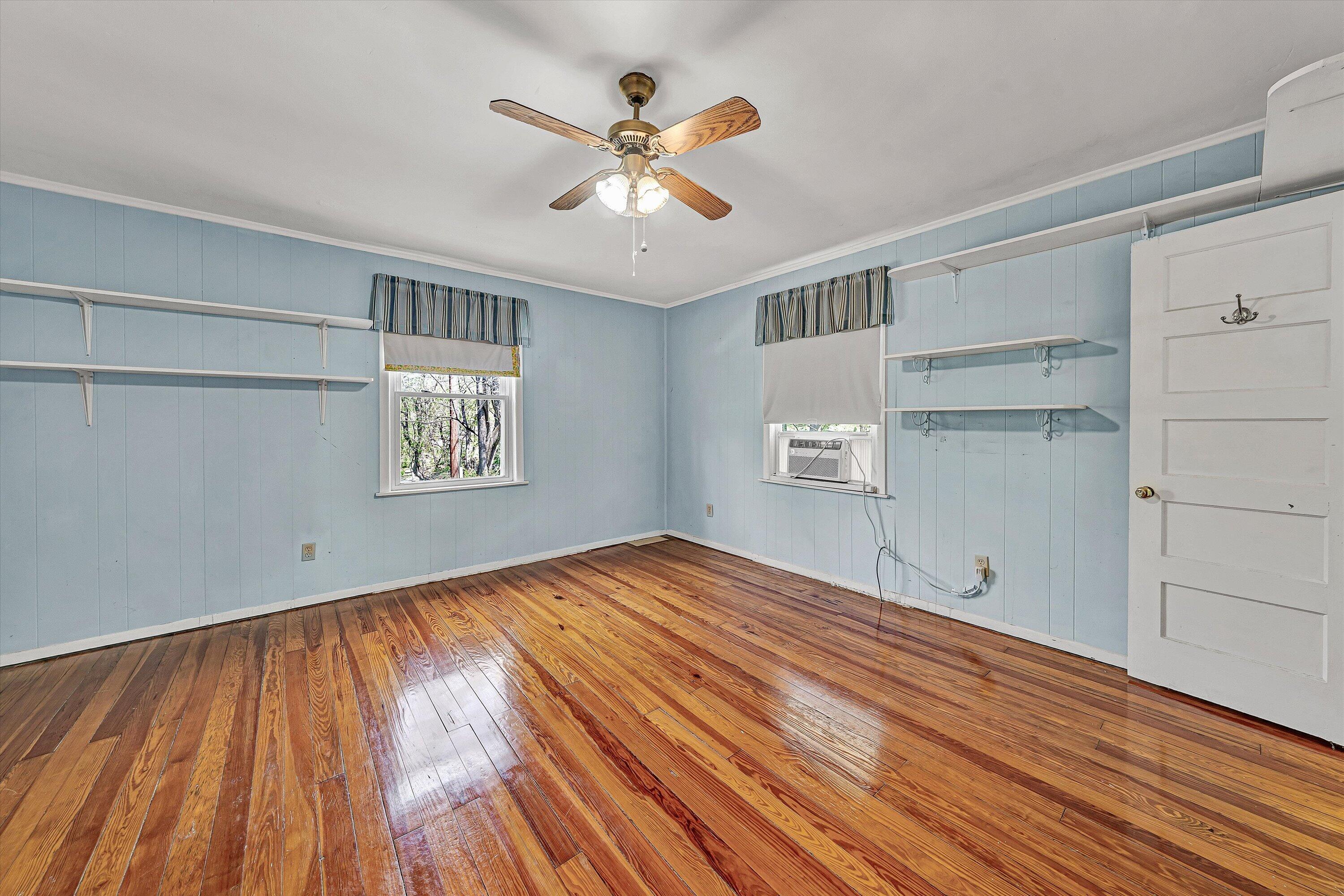 4787 Glade Creek Road Roanoke, VA 24012 - Photo 13 of 37 a view of empty room with wooden floor and fan