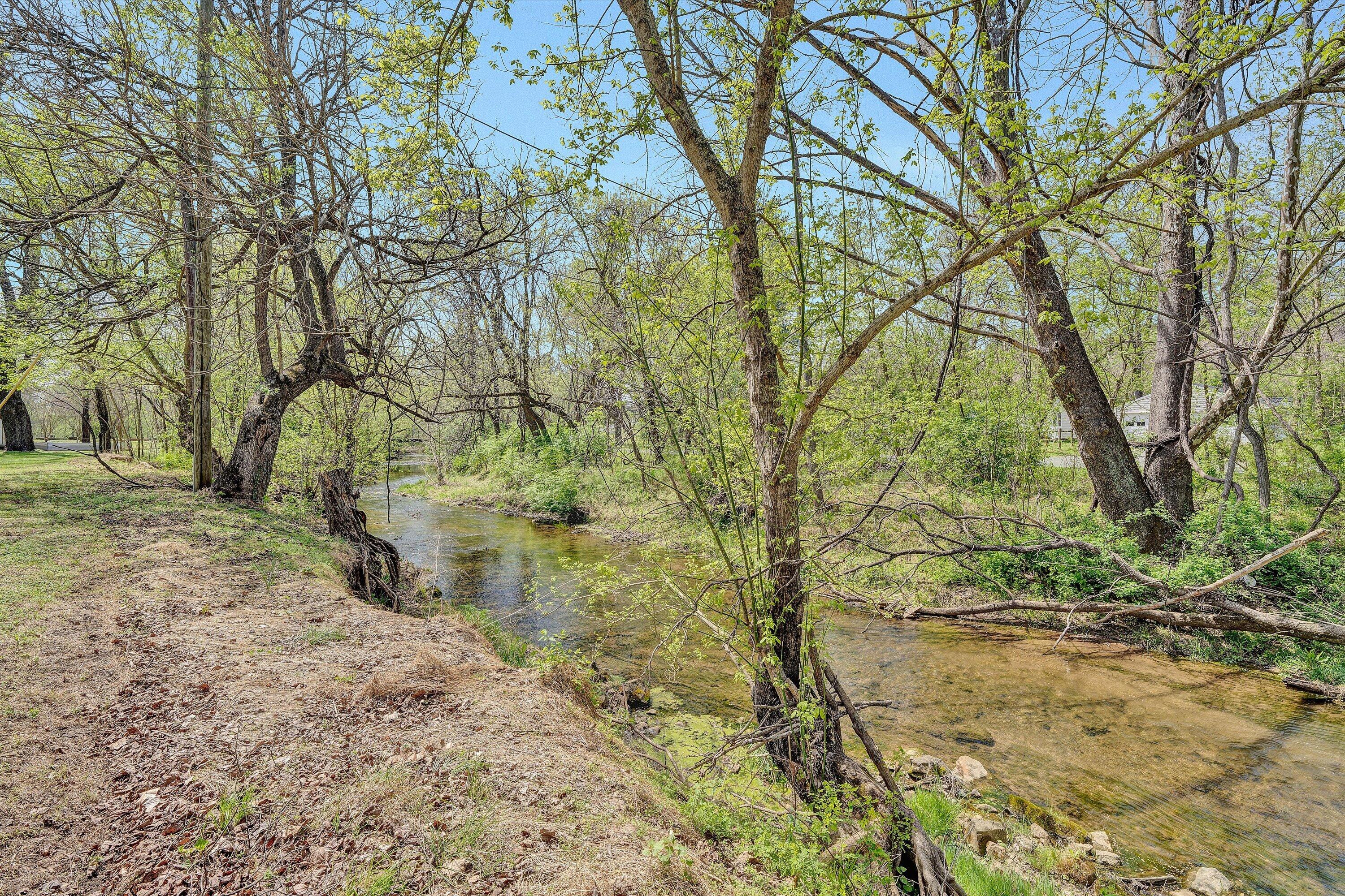 4787 Glade Creek Road Roanoke, VA 24012 - Photo 21 of 37 a backyard of a house with lots of green space
