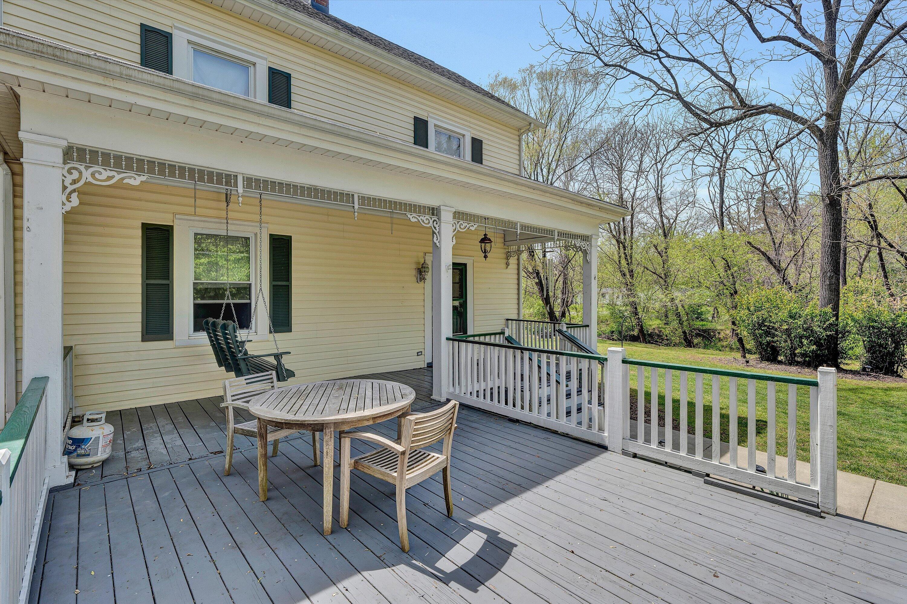 4787 Glade Creek Road Roanoke, VA 24012 - Photo 4 of 37 a view of a wooden chairs and table on the wooden floor