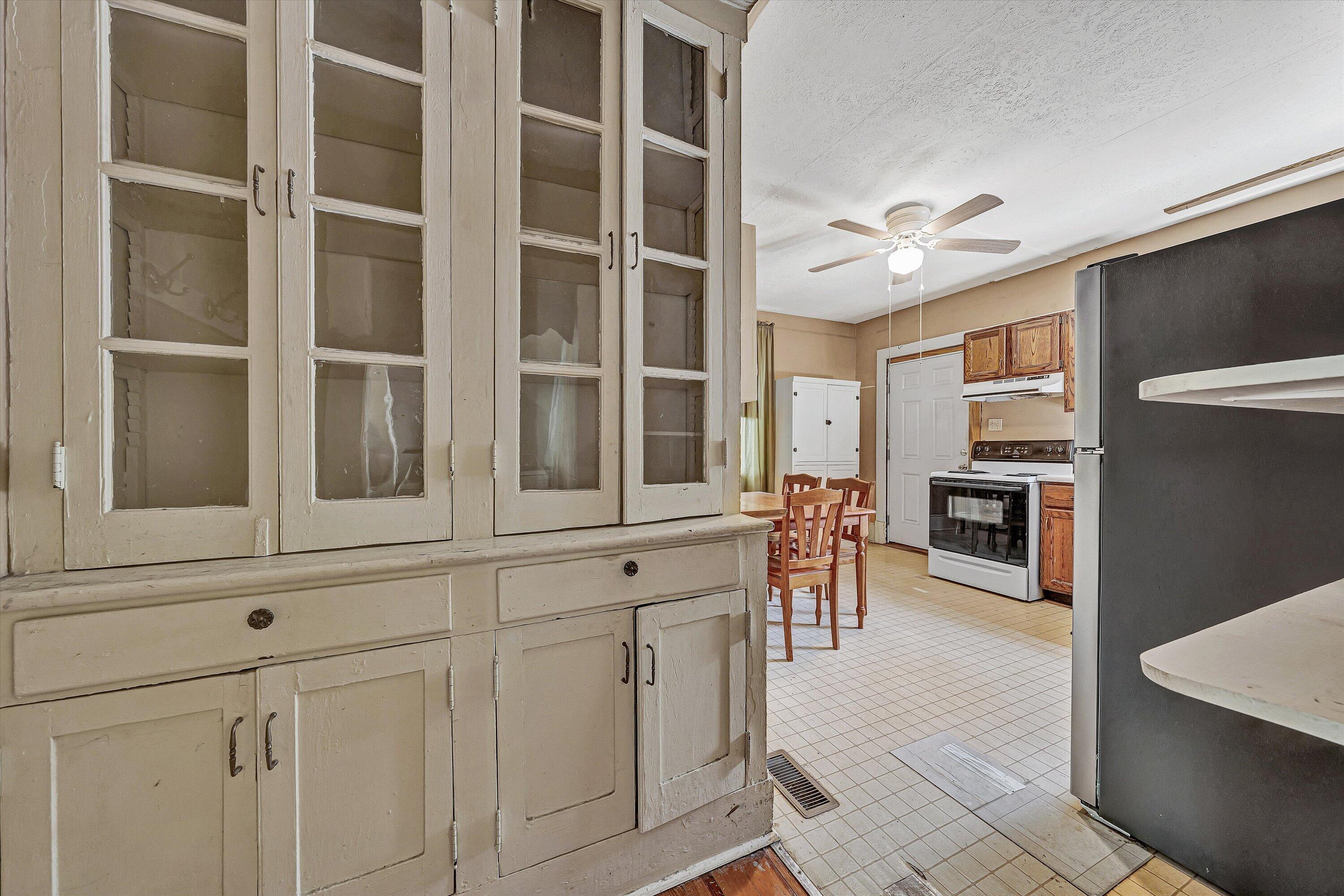 4787 Glade Creek Road Roanoke, VA 24012 - Photo 10 of 37 a view of a kitchen with an oven and cabinets