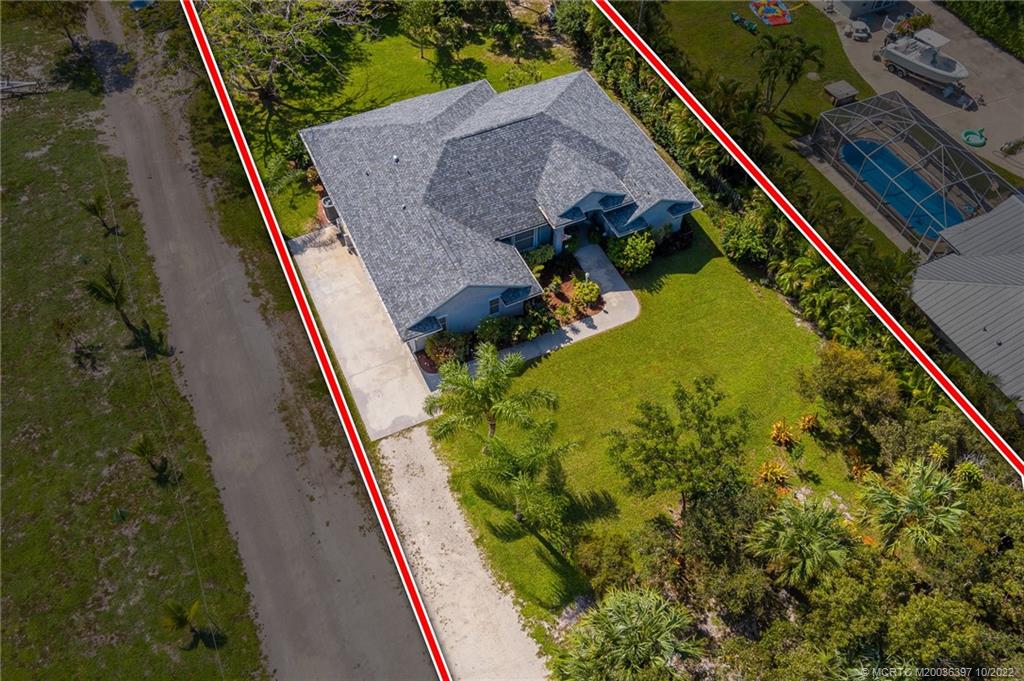 5374 Southeast Horseshoe Point Road Stuart, FL 34997 - Photo 28 of 38 a aerial view of a house