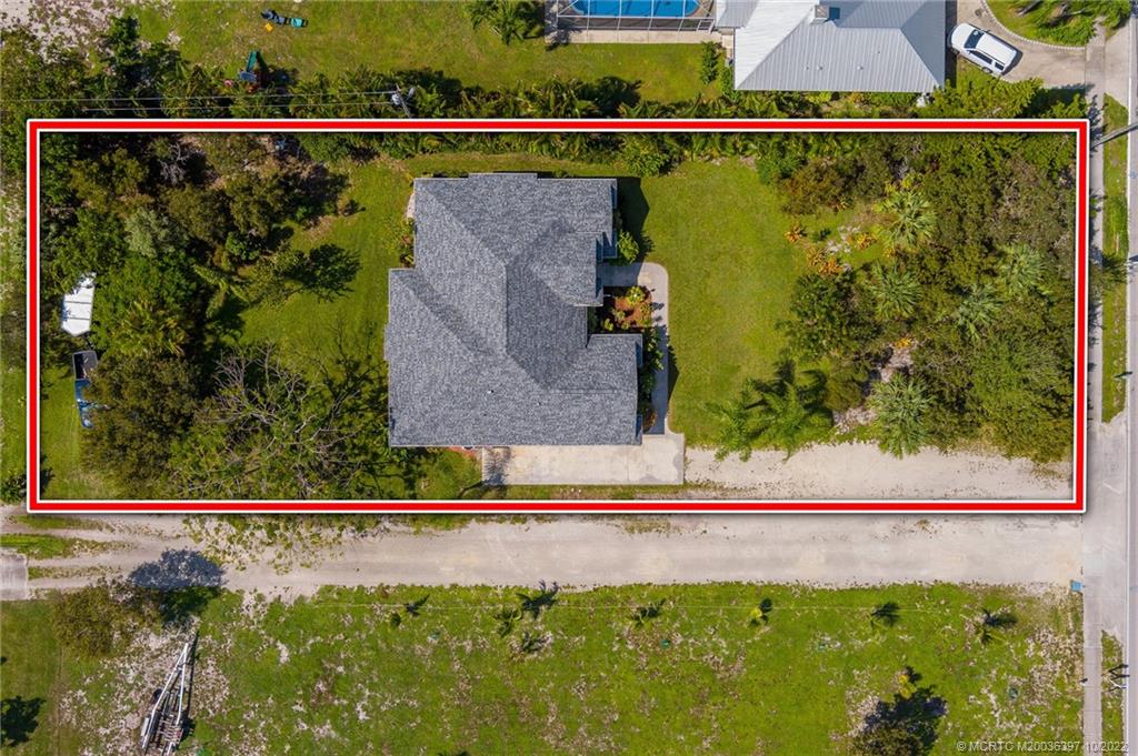 5374 Southeast Horseshoe Point Road Stuart, FL 34997 - Photo 29 of 38 a view of swimming pool with outdoor space and seating