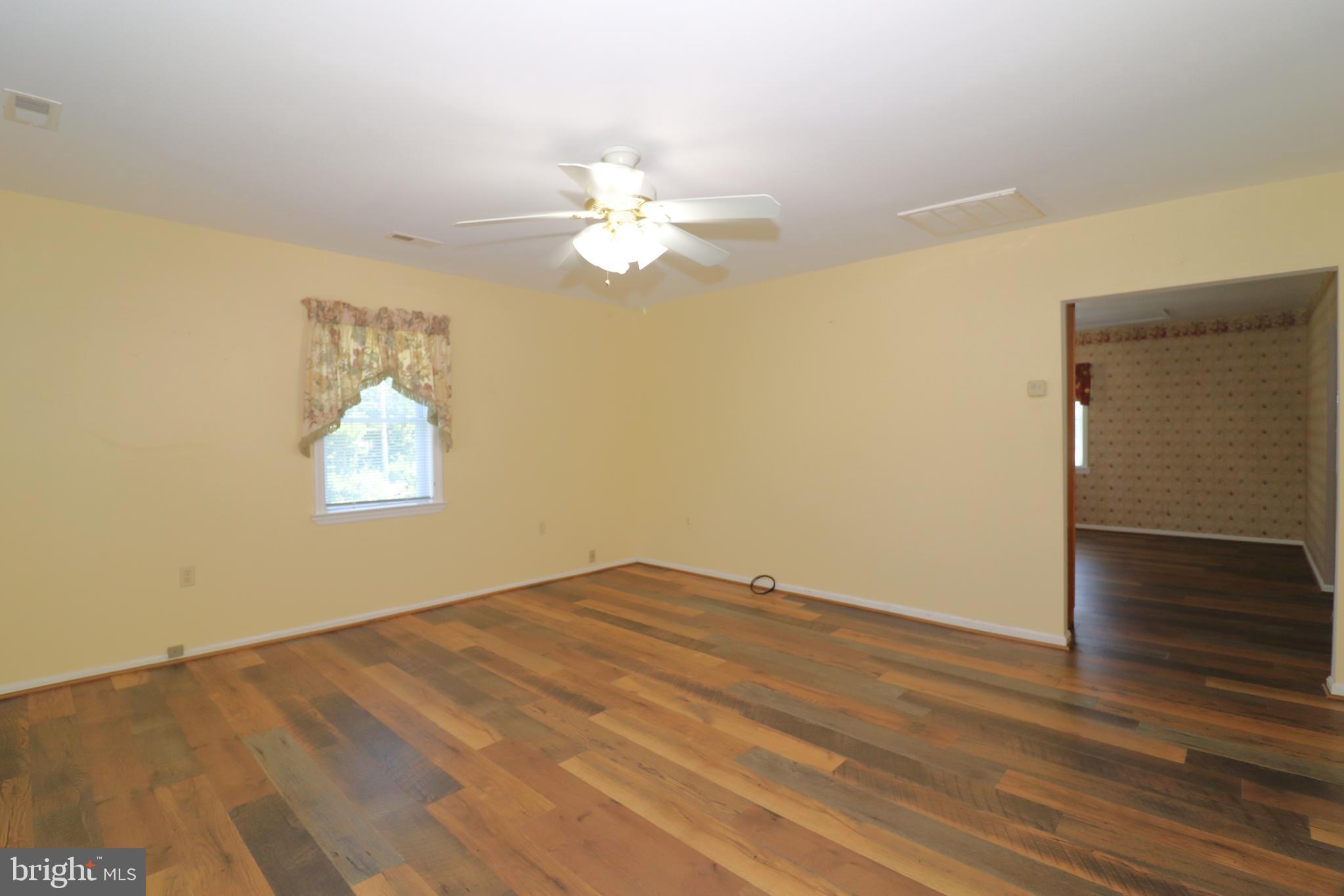 2575 Courtney School Road Midland, VA 22728 - Photo 7 of 28 Living room laminate floor