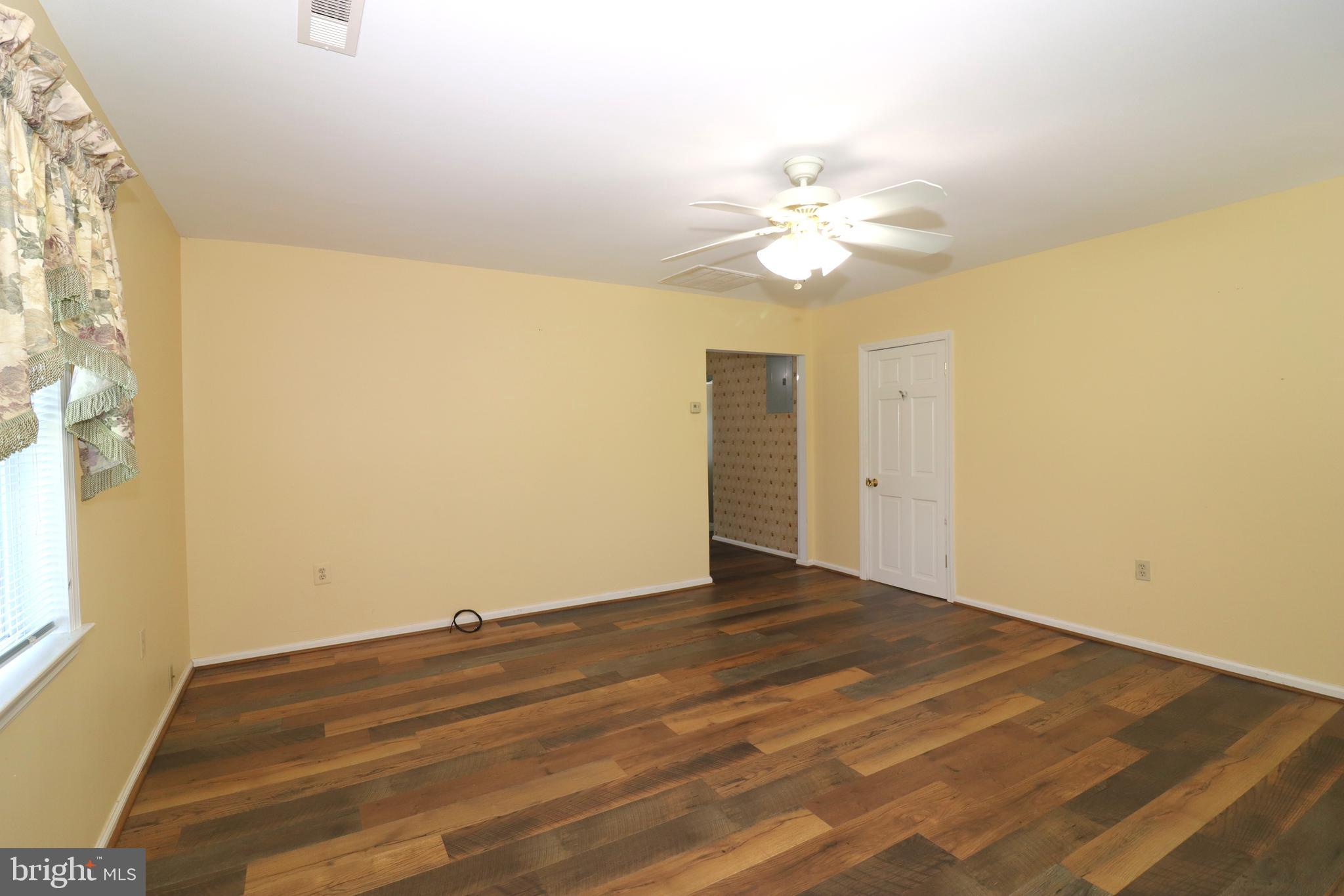 2575 Courtney School Road Midland, VA 22728 - Photo 9 of 28 Living Room leads to kitchen
