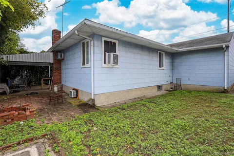 a backyard of a house with lots of green space