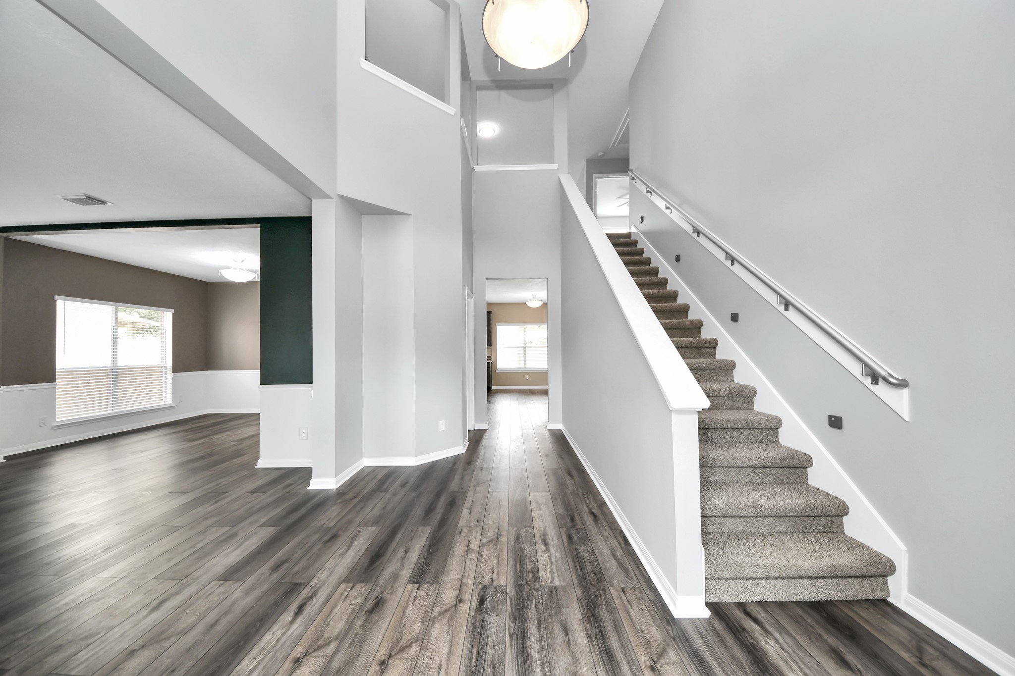 7622 McCormick Mill Court Houston, TX 77095 - Photo 2 of 37 a view of an entryway with wooden floor