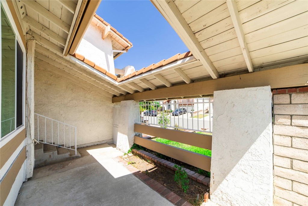 1 Camden Irvine, CA 92620 - Photo 31 of 43 a house with wooden walls and outdoor space