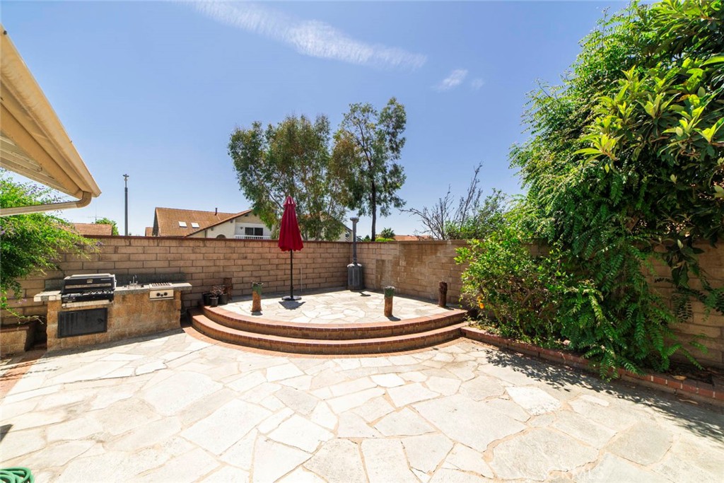1 Camden Irvine, CA 92620 - Photo 33 of 43 a vase of flowers sitting on a table