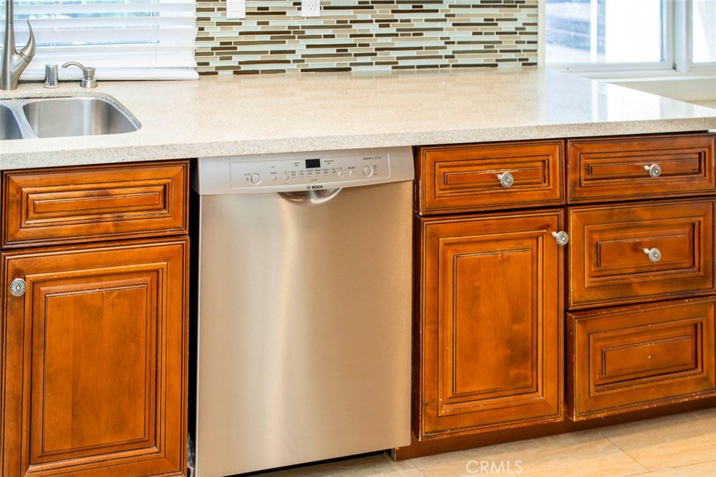 1 Camden Irvine, CA 92620 - Photo 39 of 43 a view of a refrigerator in kitchen and a sink