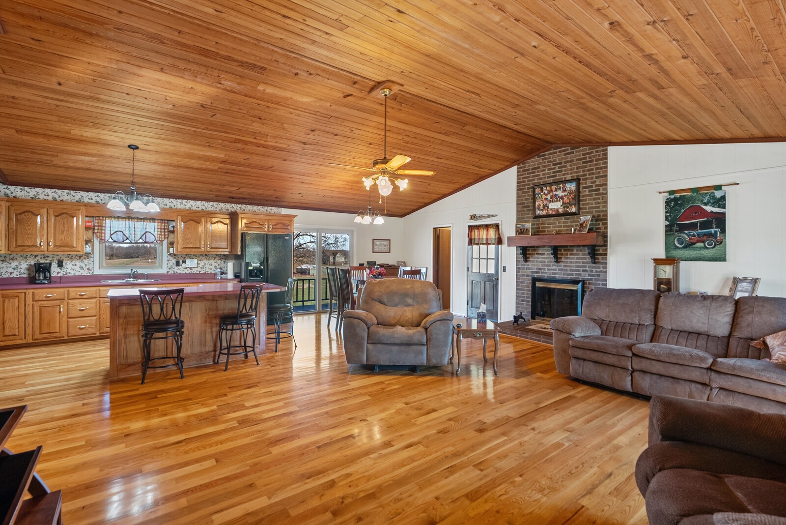 5856 Highway 76 Springfield, TN 37172 - Photo 3 of 36 a living room with furniture and a fireplace