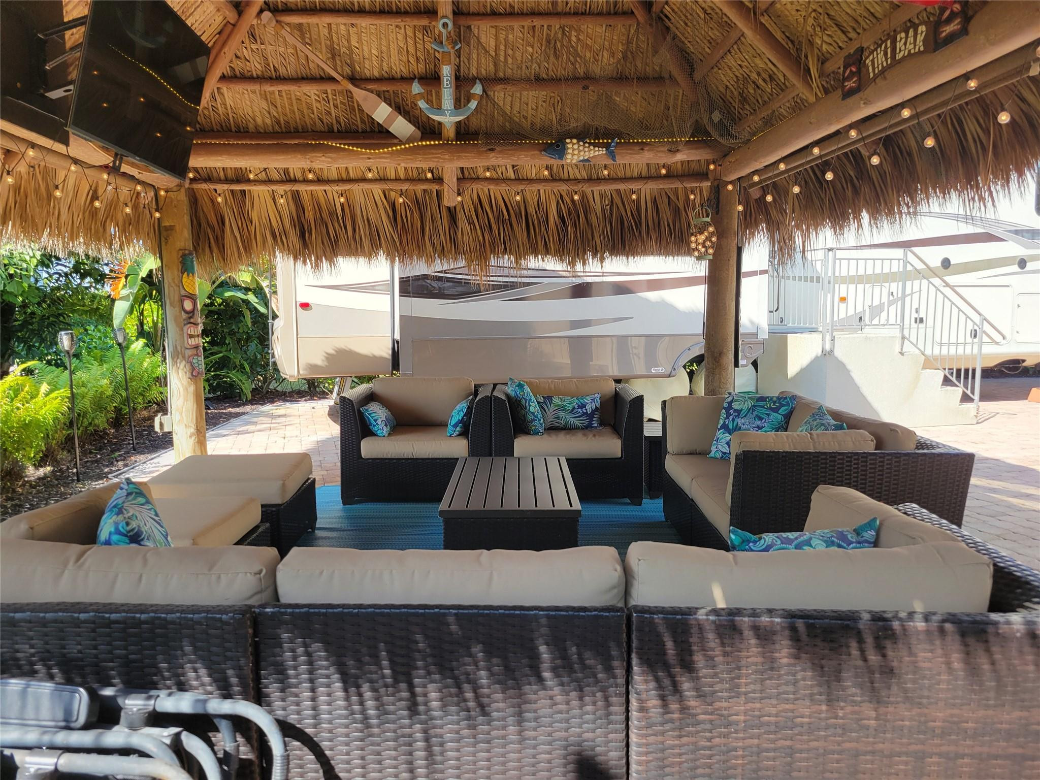 628 Southwest 35th Street Okeechobee, FL 34974 - Photo 16 of 27 a view of a patio with couches and potted plants