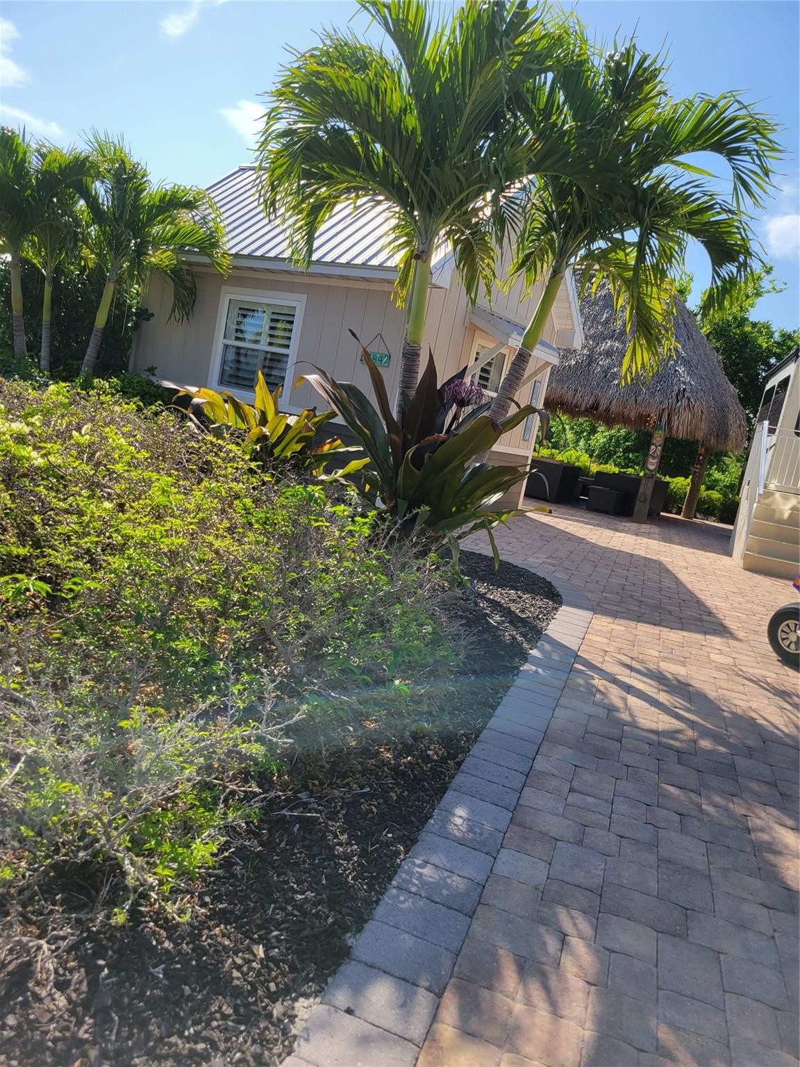628 Southwest 35th Street Okeechobee, FL 34974 - Photo 2 of 27 a view of a house with a yard