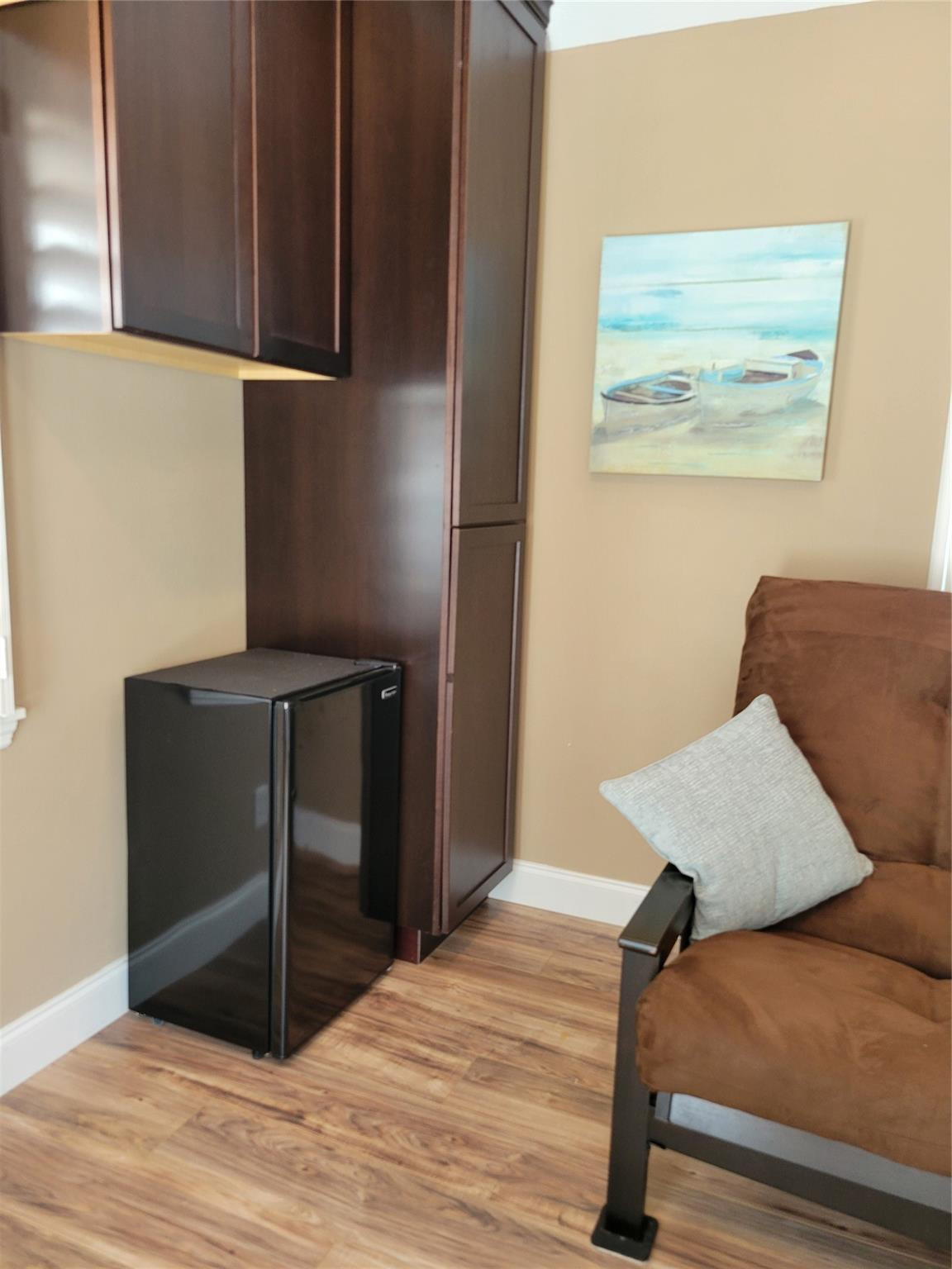 628 Southwest 35th Street Okeechobee, FL 34974 - Photo 10 of 27 a bedroom with a bed and wooden floor
