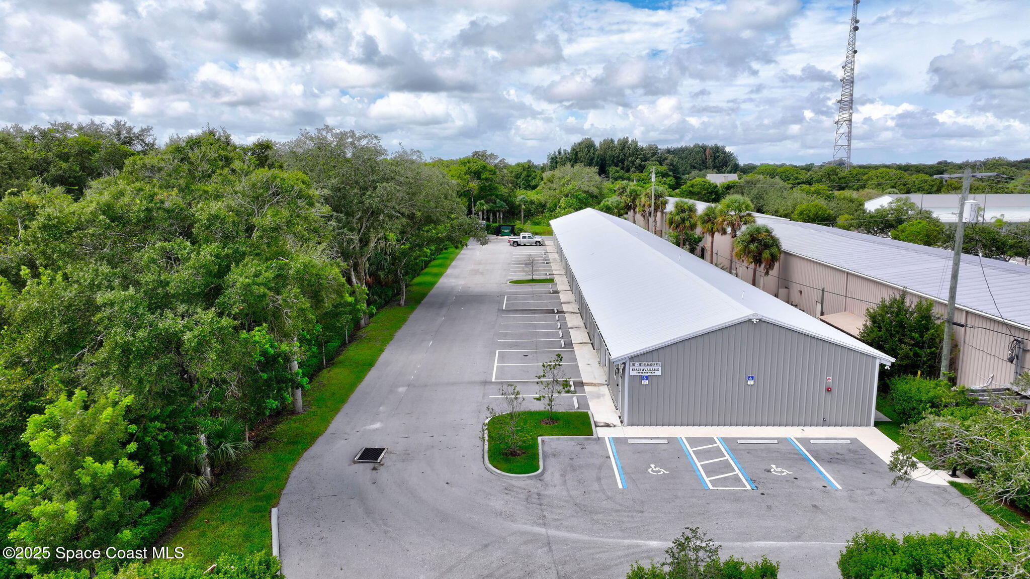 an aerial view of a house with yard