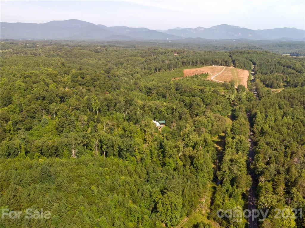 2915 Big Level Road Mill Spring, NC 28756 - Photo 1 of 26 a view of lake and mountain