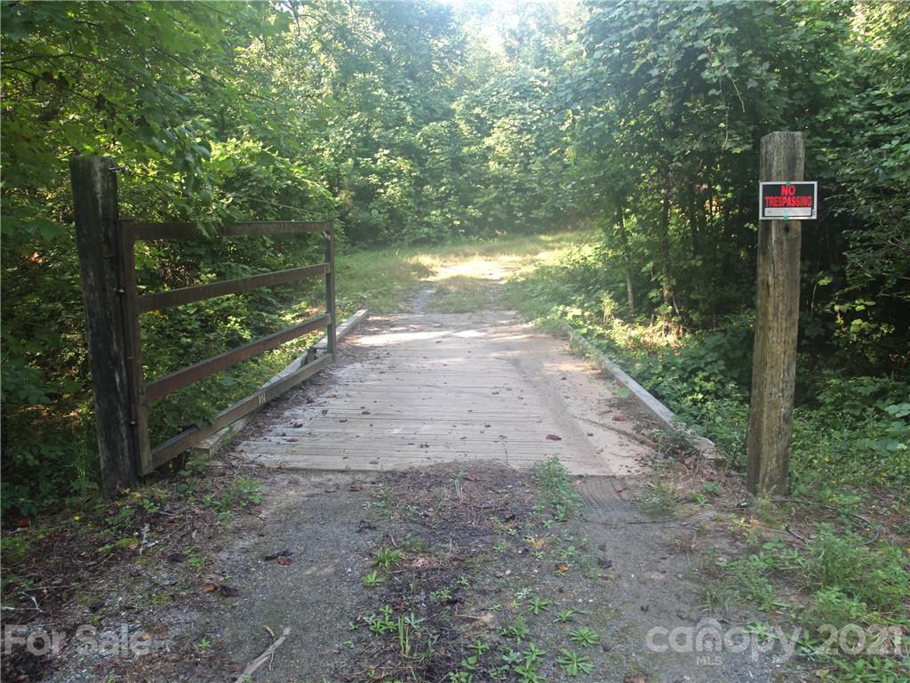 2915 Big Level Road Mill Spring, NC 28756 - Photo 23 of 26 a pathway of a yard