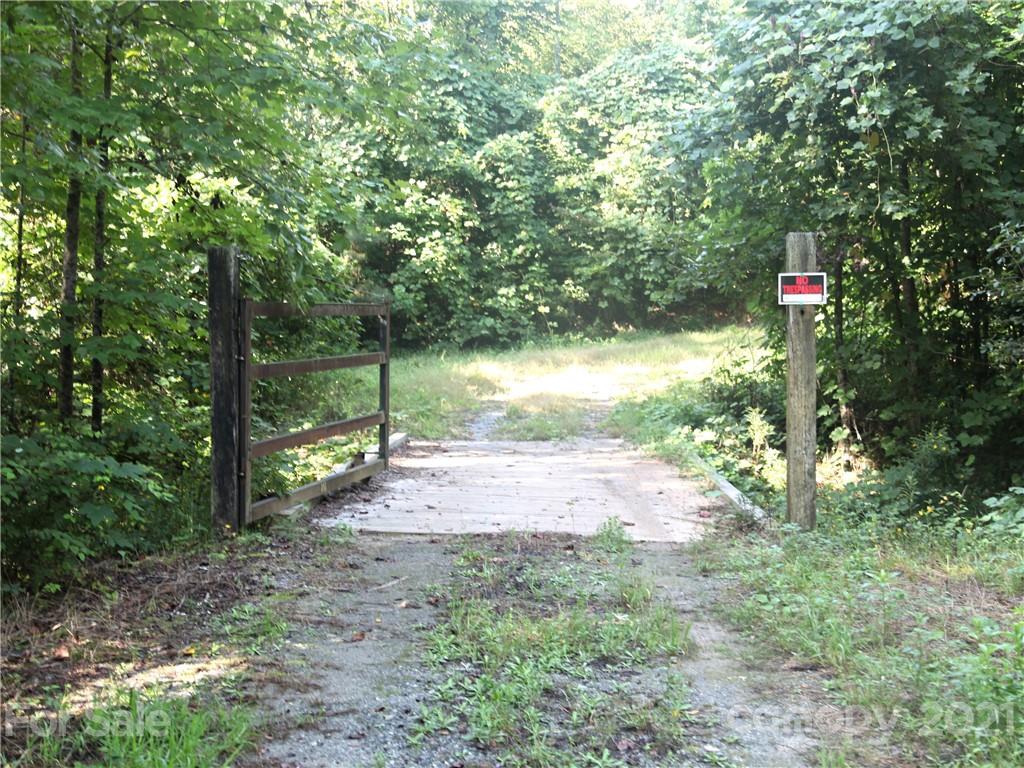 2915 Big Level Road Mill Spring, NC 28756 - Photo 7 of 26 a view of a road with trees in the background