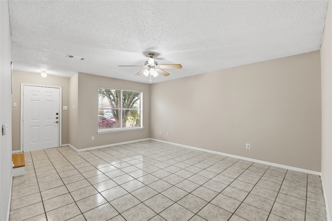 7718 Sign Street Houston, TX 77489 - Photo 5 of 24 a view of an empty room with window