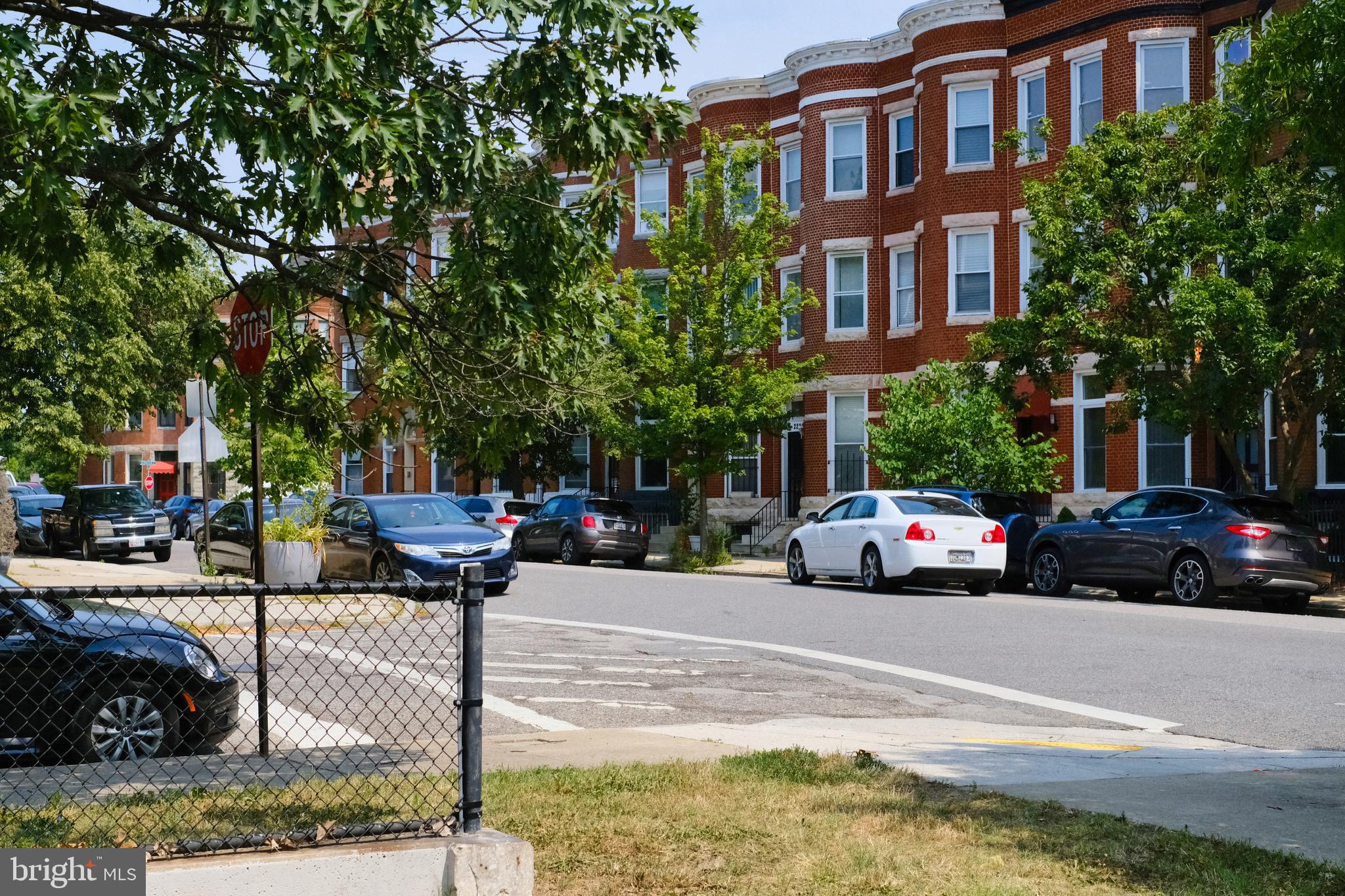 2225 Brookfield Avenue Baltimore, MD 21217 - Photo 1 of 28 a view of street with parked cars