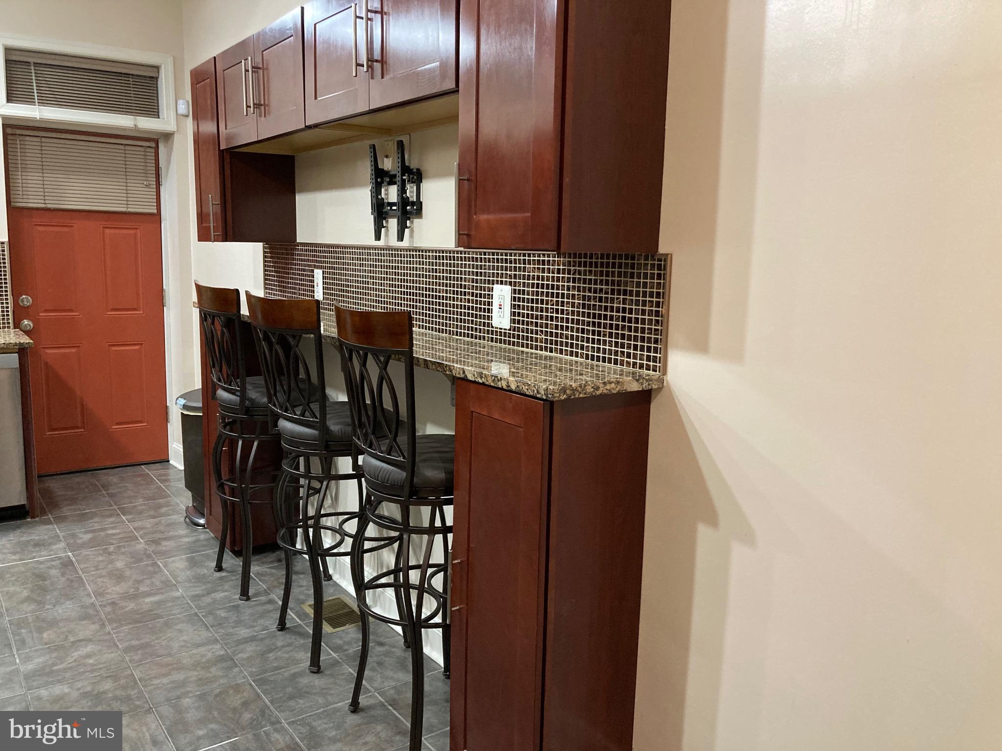 2225 Brookfield Avenue Baltimore, MD 21217 - Photo 22 of 28 a view of dinning room with chairs