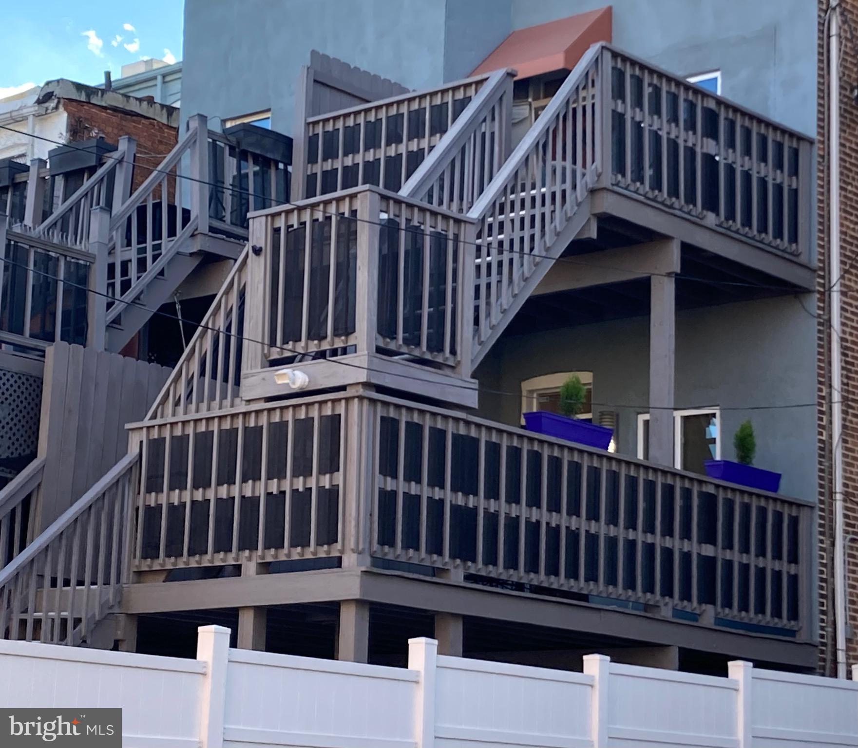 2225 Brookfield Avenue Baltimore, MD 21217 - Photo 28 of 28 a view of a brick building with a roof deck