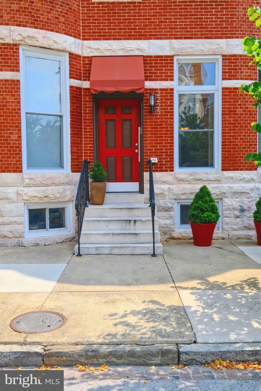 2225 Brookfield Avenue Baltimore, MD 21217 - Photo 3 of 28 a view of a house with front door