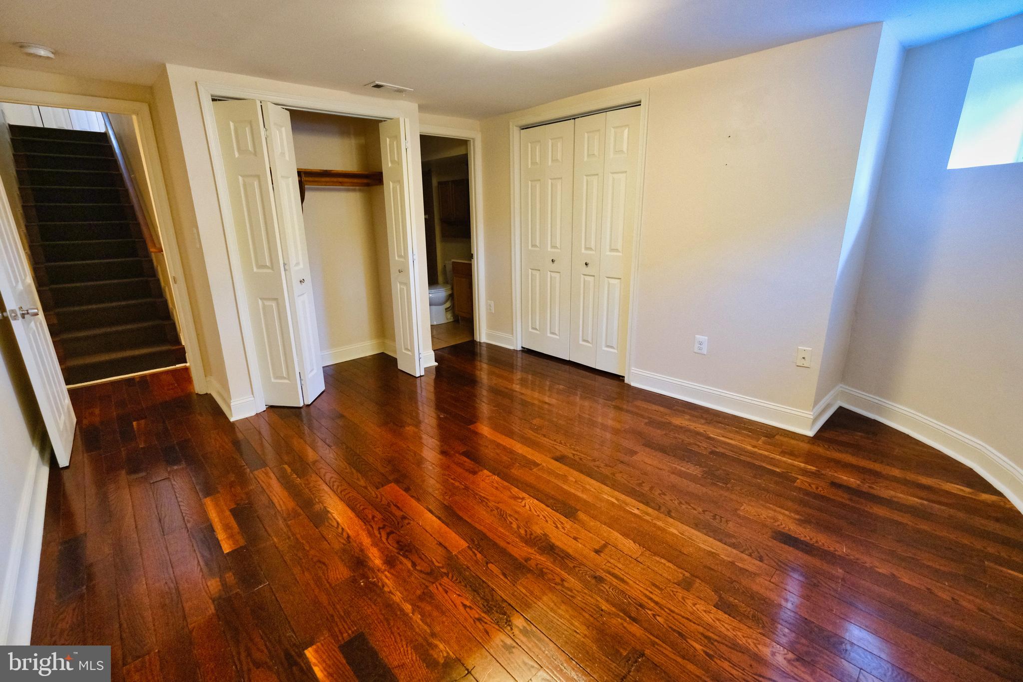 2225 Brookfield Avenue Baltimore, MD 21217 - Photo 8 of 28 wooden floor in an empty room