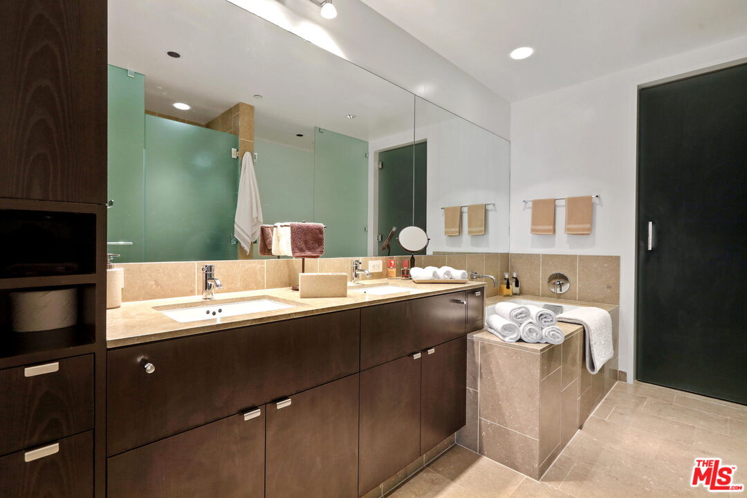 6250 Hollywood Boulevard, Unit 5J Los Angeles, CA 90028 - Photo 20 of 40 a bathroom with a sink double vanity and a mirror