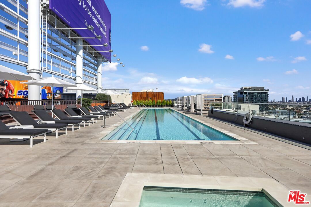 6250 Hollywood Boulevard, Unit 5J Los Angeles, CA 90028 - Photo 26 of 40 a view of a swimming pool with an outdoor seating