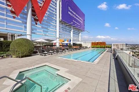 a view of a street with benches