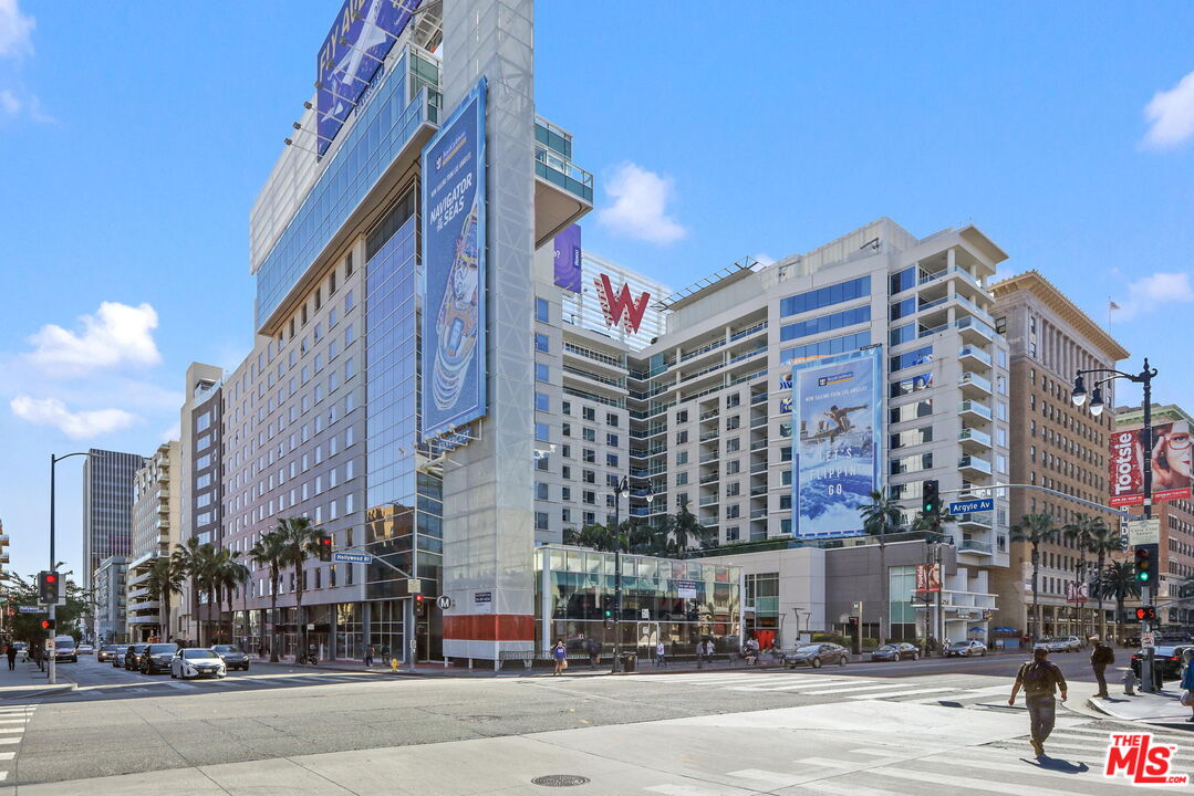 6250 Hollywood Boulevard, Unit 5J Los Angeles, CA 90028 - Photo 38 of 40 a city street filled with lots of tall buildings