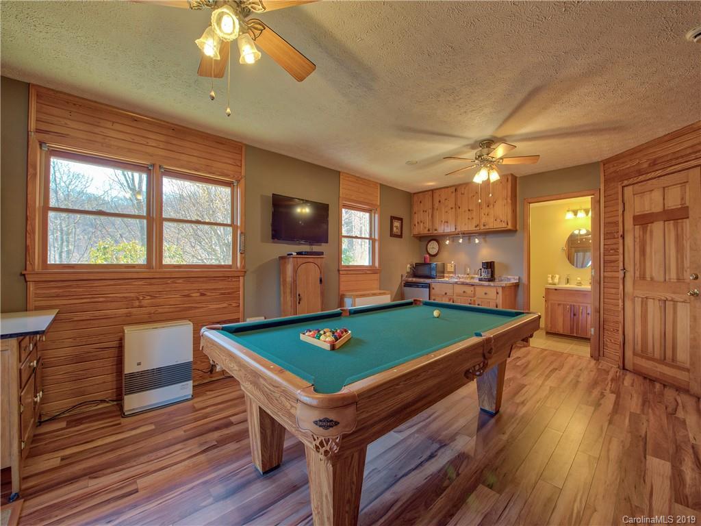 464 Bent Tree Road Maggie Valley, NC 28751 - Photo 18 of 38 a room with pool table and windows