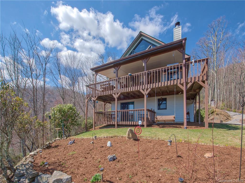 464 Bent Tree Road Maggie Valley, NC 28751 - Photo 3 of 38 a view of a house with a yard